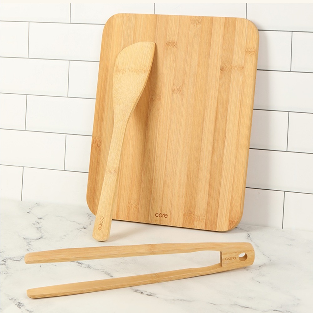 3 FOR $20: Bamboo serving set with cutting board, tongs, and wooden spatula.